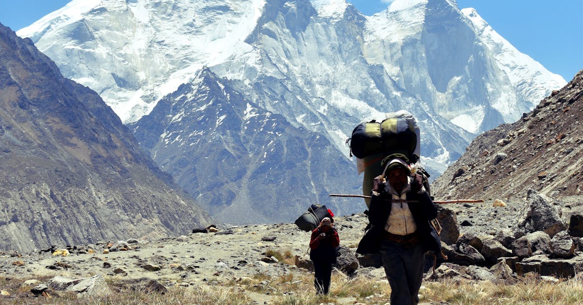 People Walking on Dirt Road