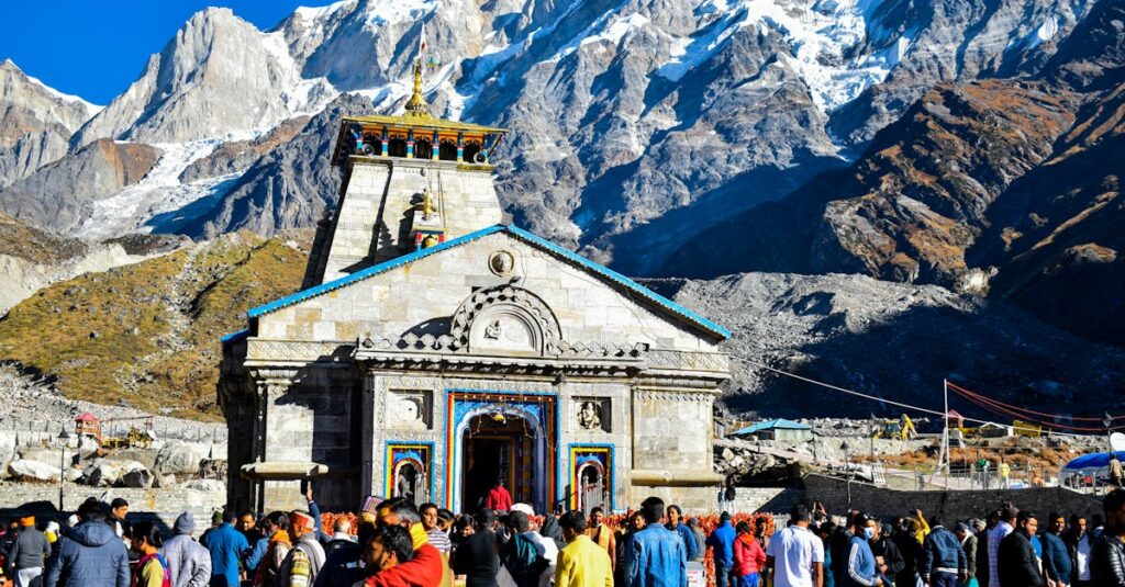 A Crowd Standing in front of the Kedarnath Temple in Kedarnath, India during a Ceremony