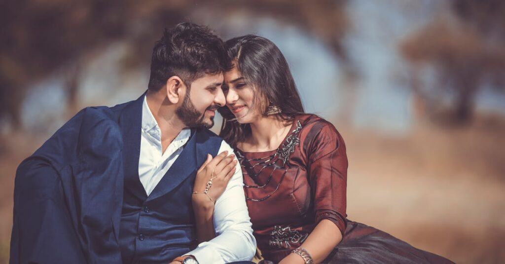 Selective Focus Photography of Man and Woman Sitting on Ground